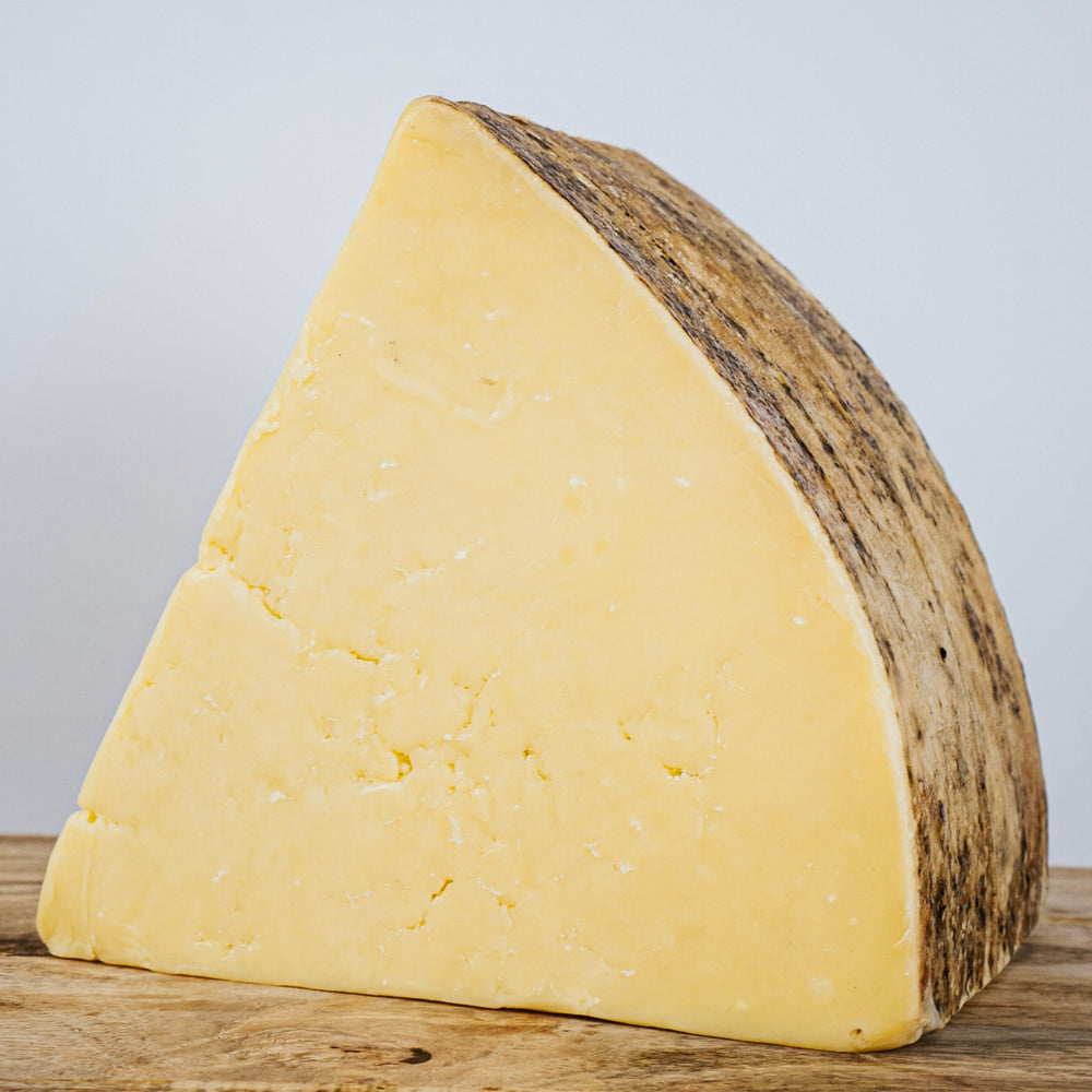 Quickes English Cheddar 18mth Cloth Bound Cave Aged